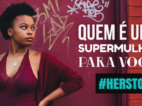 Imagem promocional do concurso #HerStory, que diz: "Quem é uma supermulher para você?"